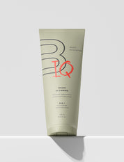 Tube of body lotion with BODIQ branding on a white background