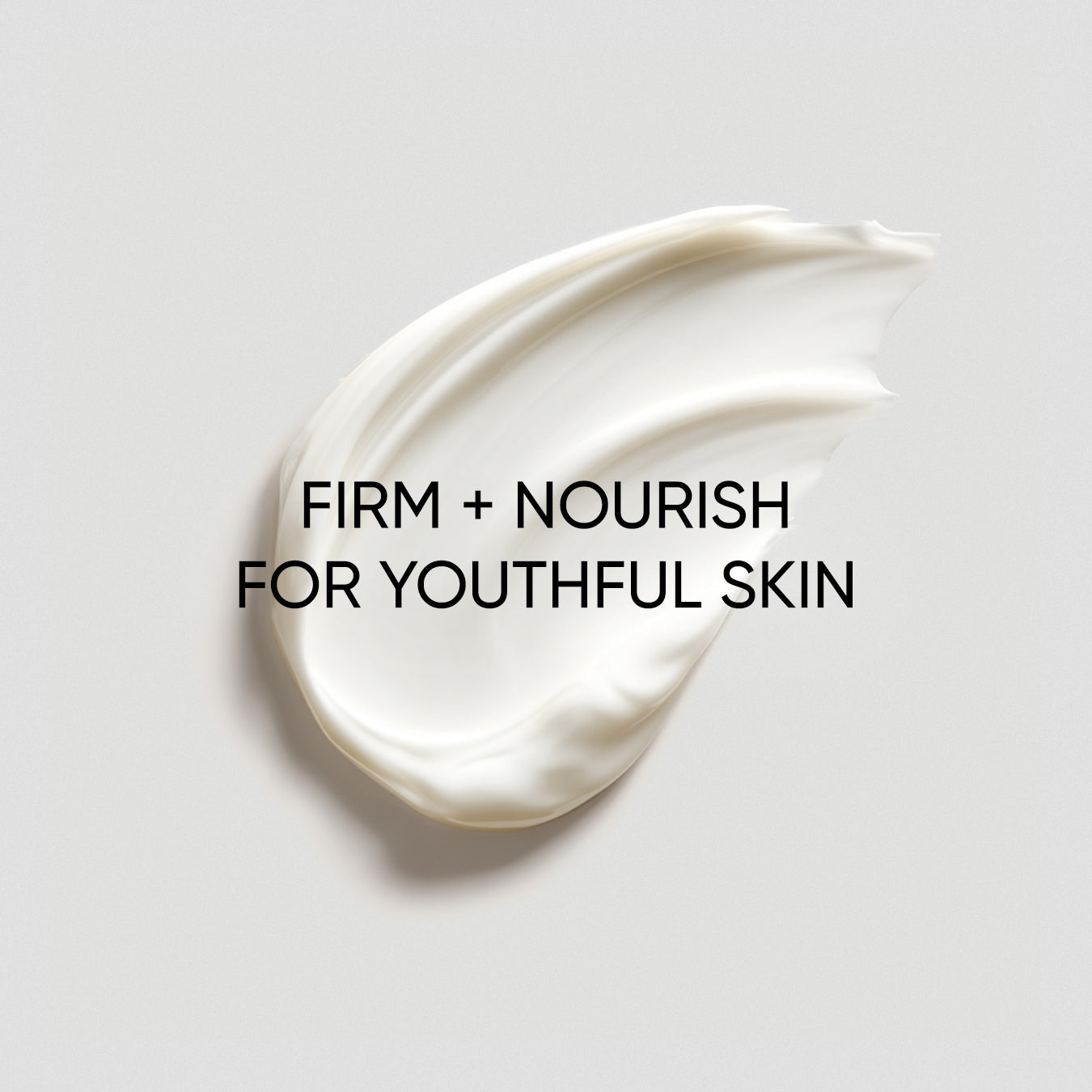 White cream smear on a light gray background with text 'Firm + Nourish for Youthful Skin'.