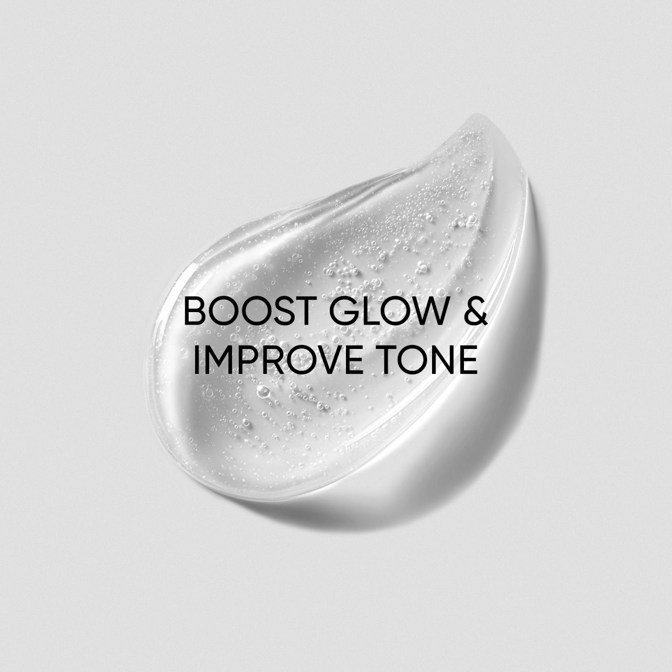 Silver droplet with text 'Boost Glow & Improve Tone' on a gray background